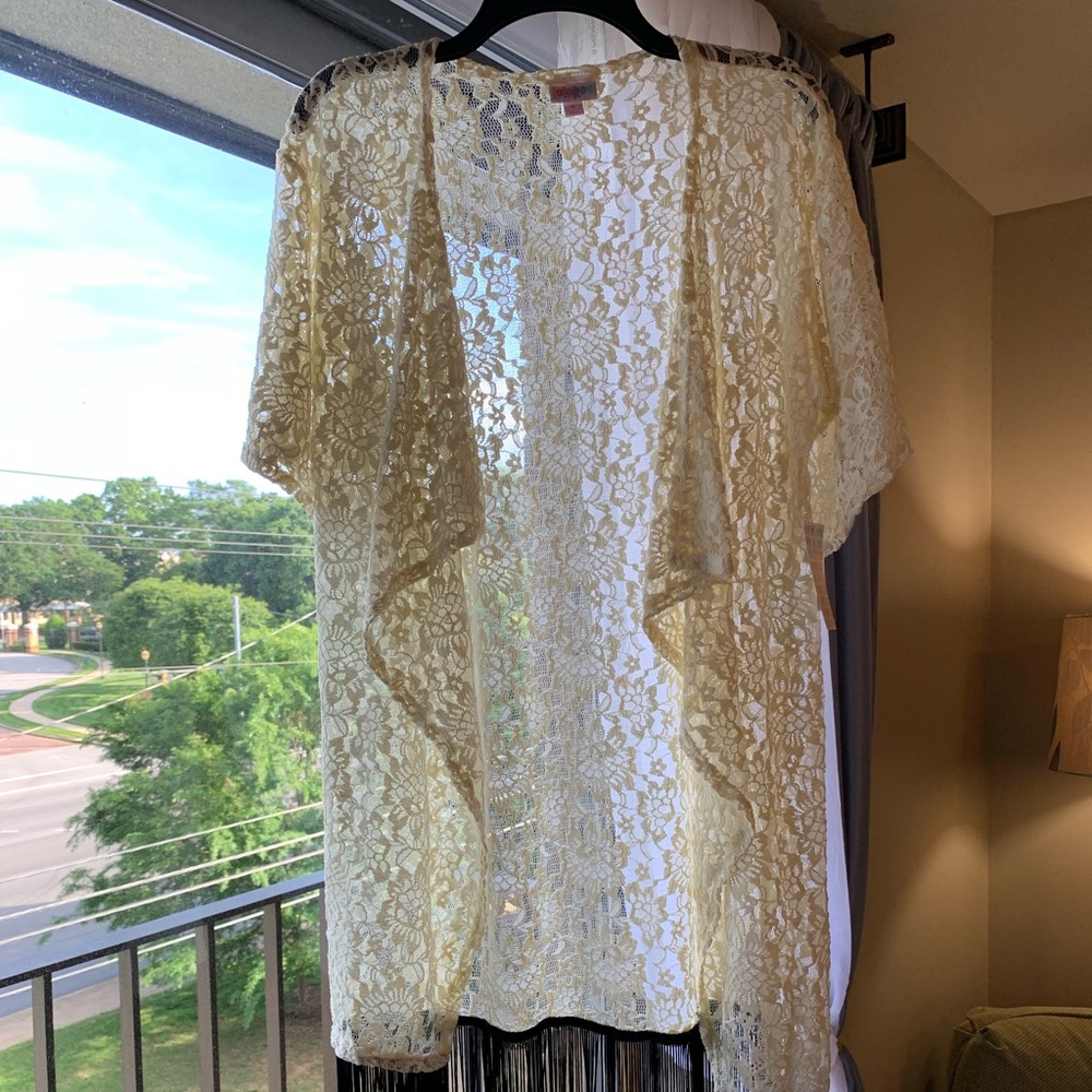 Lularoe cream duster!